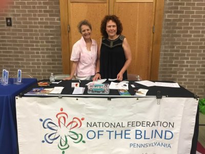 Amy and Connie at the National Federation of the Blind vendor table