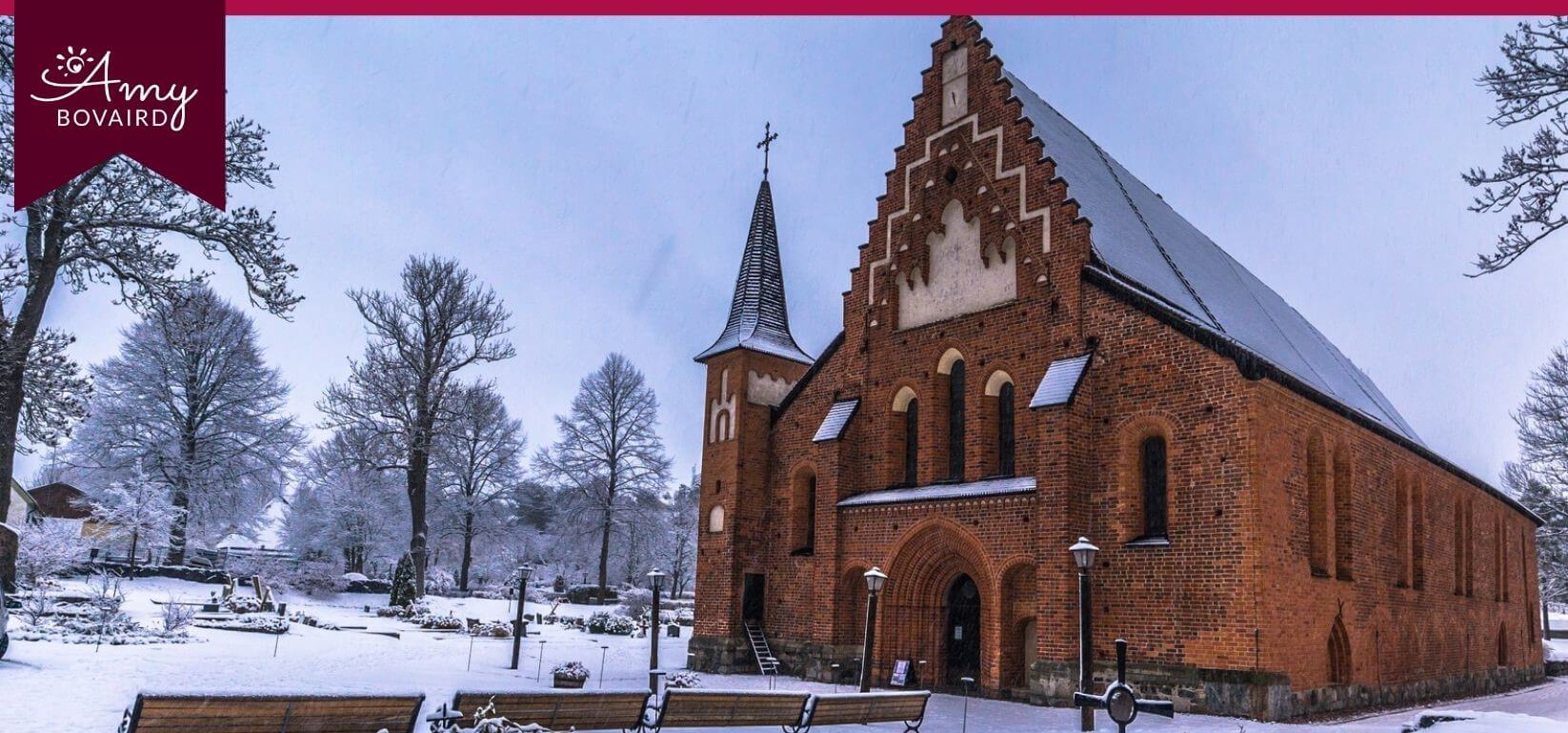traditional old brick church in winter scene - blog featured image